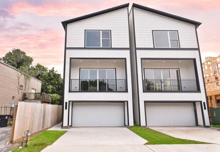 Elegant 4-level contemporary home with fenced yard and Houston sky line views. 4 homes available!