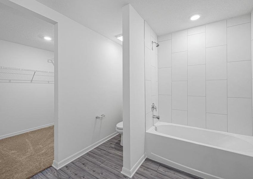 Master bathroom includes shower and walk-in closet