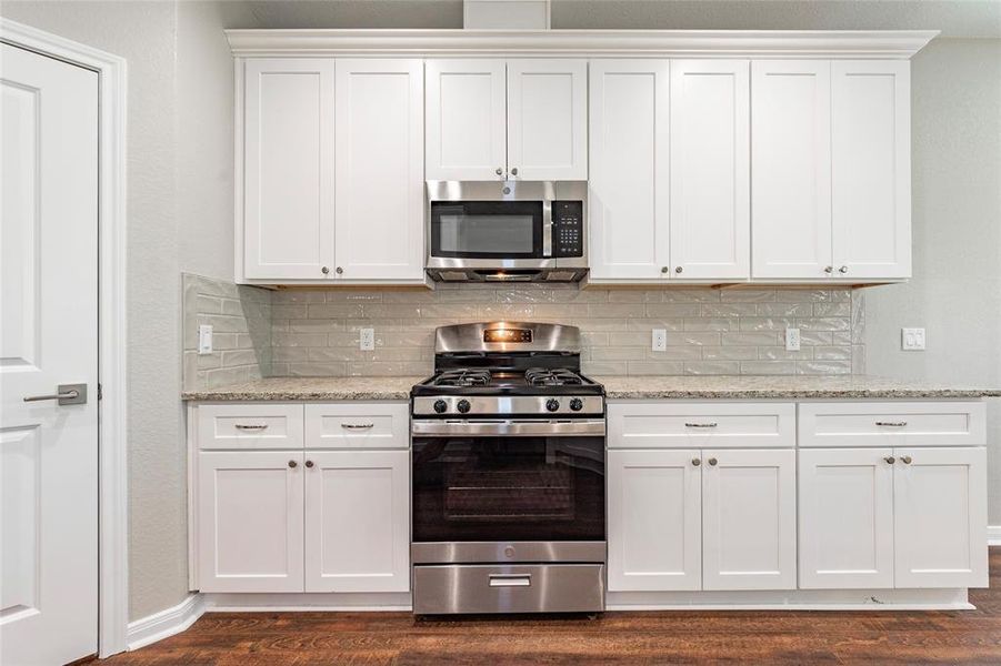 Ample cabinet space with stainless appliances