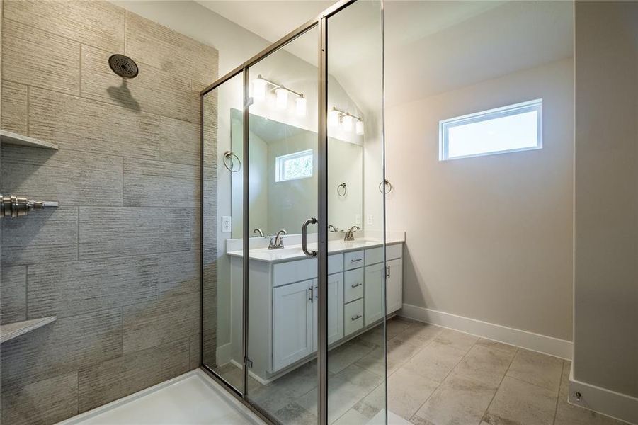 You'll never want to leave the spacious, walk in shower in your new owners bath!