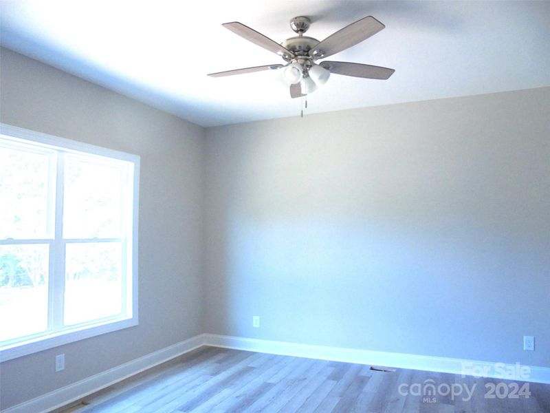 Wondeerful Primary Bedroom with ceiling fan- LVP flooring!