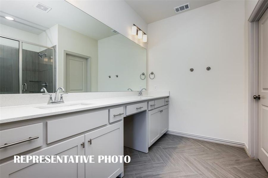 You'll find plenty of space for two in this fantastic owner's bath.  REPRESENTATIVE PHOTO.