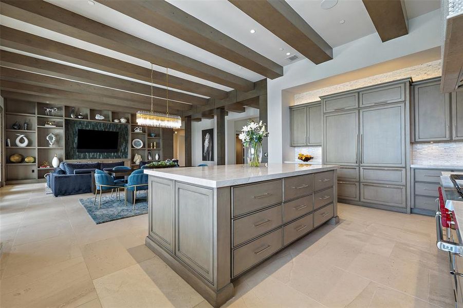 Experience the seamless flow of the open layout, creating a cohesive and inviting atmosphere for entertaining.