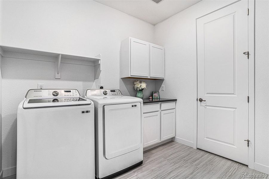 Laundry Room With Utility Sink