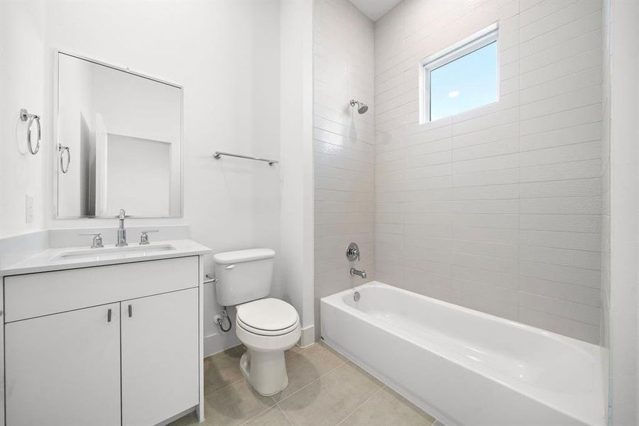 Upscale modern finishes in all secondary bathrooms.