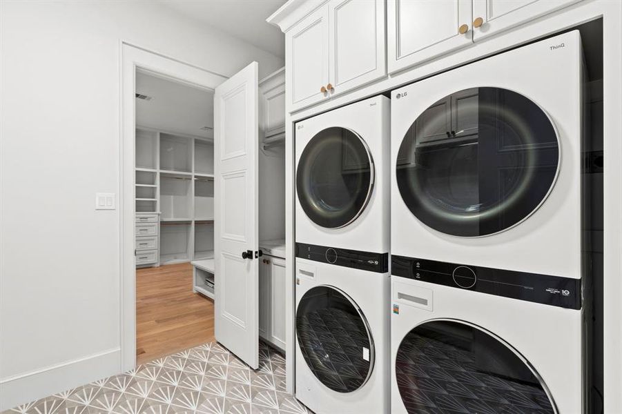 Laundry Room comes equipped with TWO SETS of Washer/Dryer.