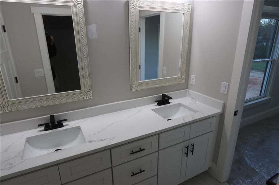 Bathroom with dual bowl vanity