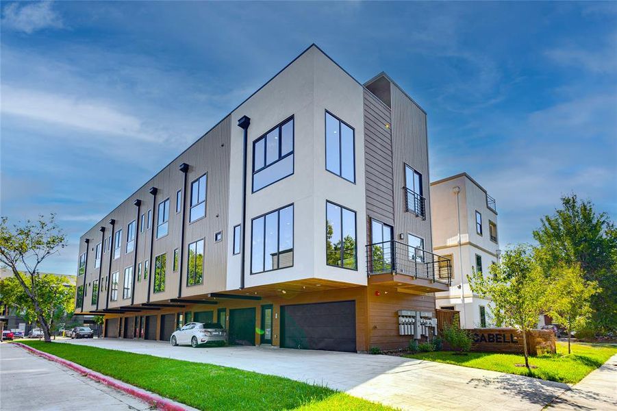 View of building exterior featuring a garage