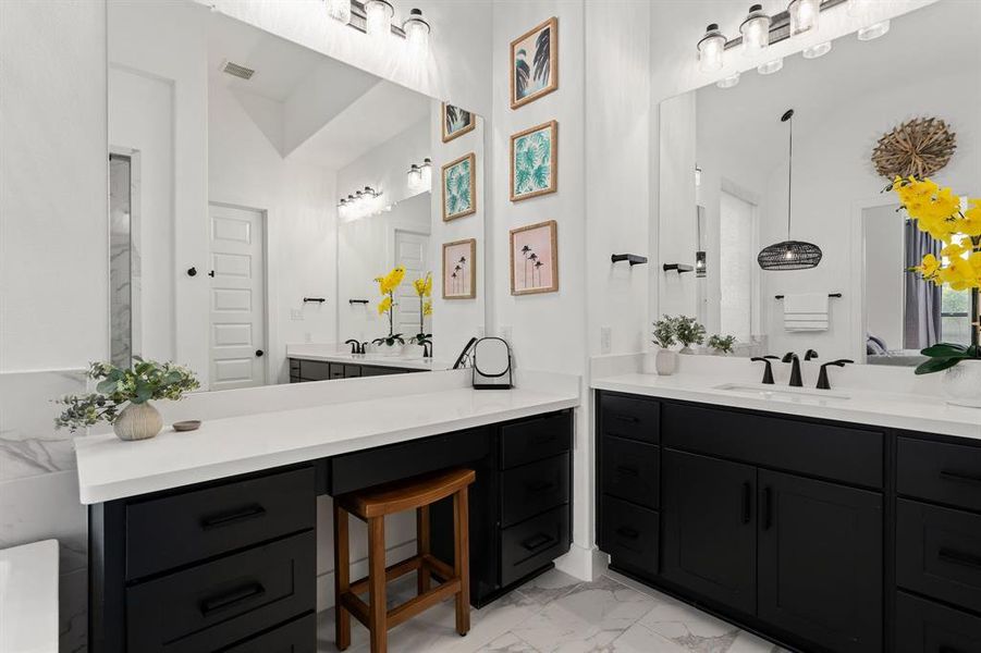 The separate vanity area is the perfect area to get ready in the morning.