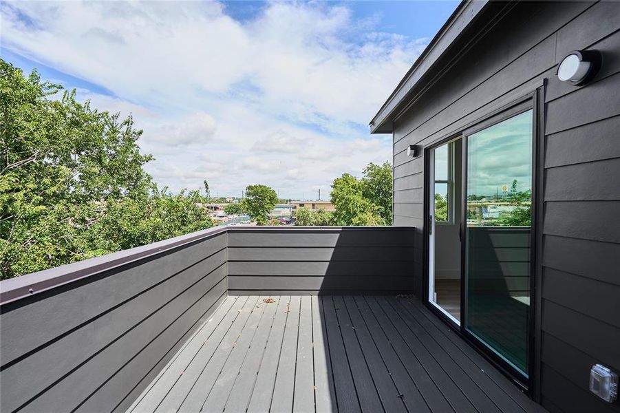 large patio adjacent to primary bedroom