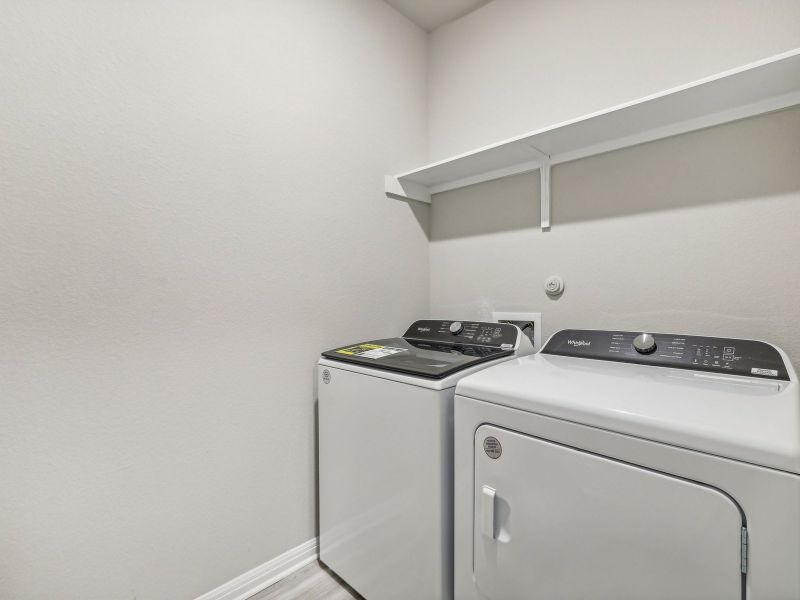 The spacious laundry room helps make laundry day a breeze.