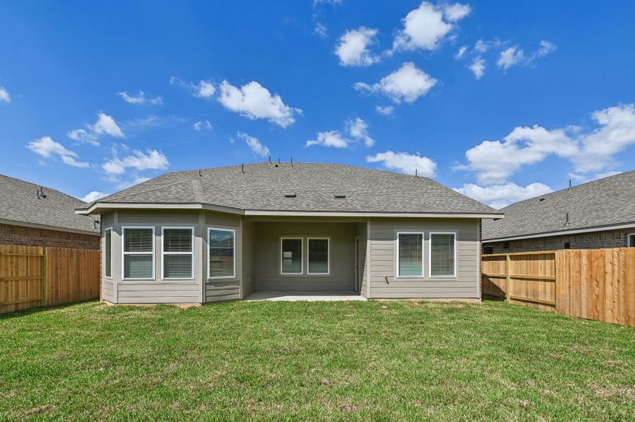 The backyard of a home in Stewart's Ranch in Conroe, TX.