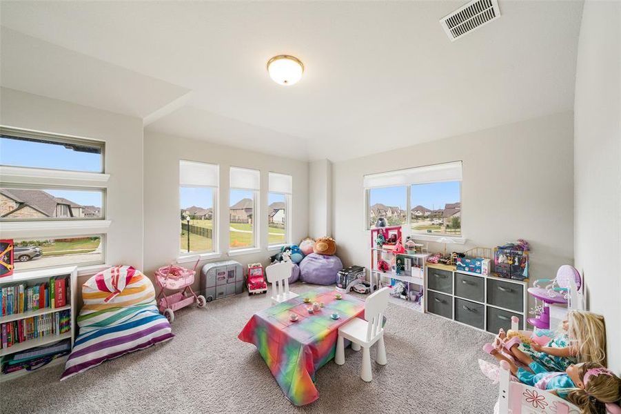 The windows are great in this bedroom.  Currently used as a playroom!