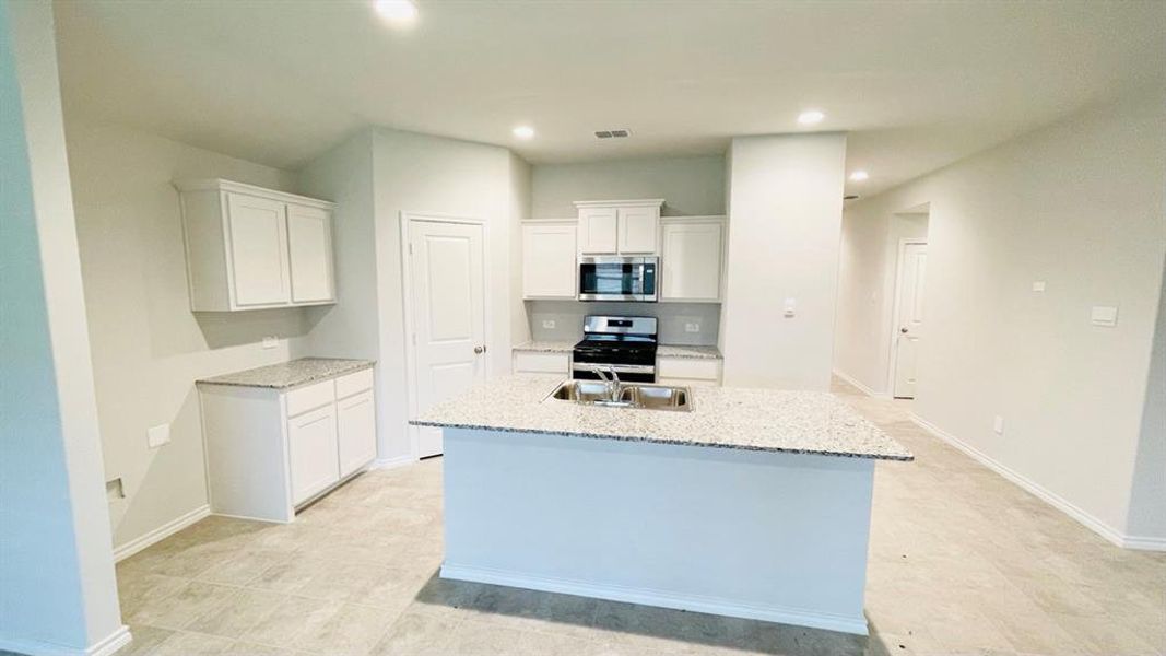 Kitchen - All Home and community information, including pricing, included features, terms, availability and amenities, are subject to change at any time without notice or obligation. All Drawings, pictures, photographs, video, square footages, floor plans, elevations, features, colors and sizes are approximate for illustration purposes only and will vary from the homes as built.