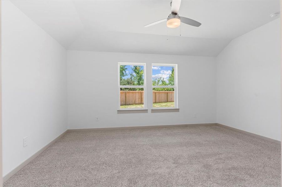 The Primary Suite Bedroom has High Tray Ceilings, and Luxurious Primary Suite Bathroom made for Two! **Image Representative of Plan Only and May Vary as Built**