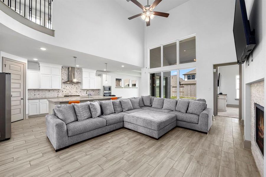 The family room large enough for even the biggest sectional sofas.  The luxury vinyl flooring make upkeep very easy.