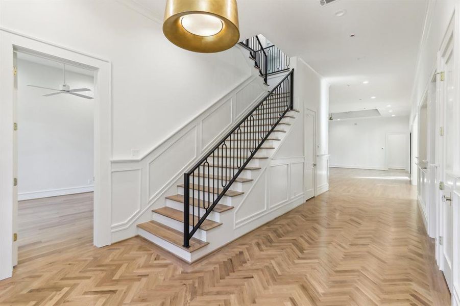 The foyer is also home to the staircase - the ironwork on the staircase is an original design and was handcrafted.