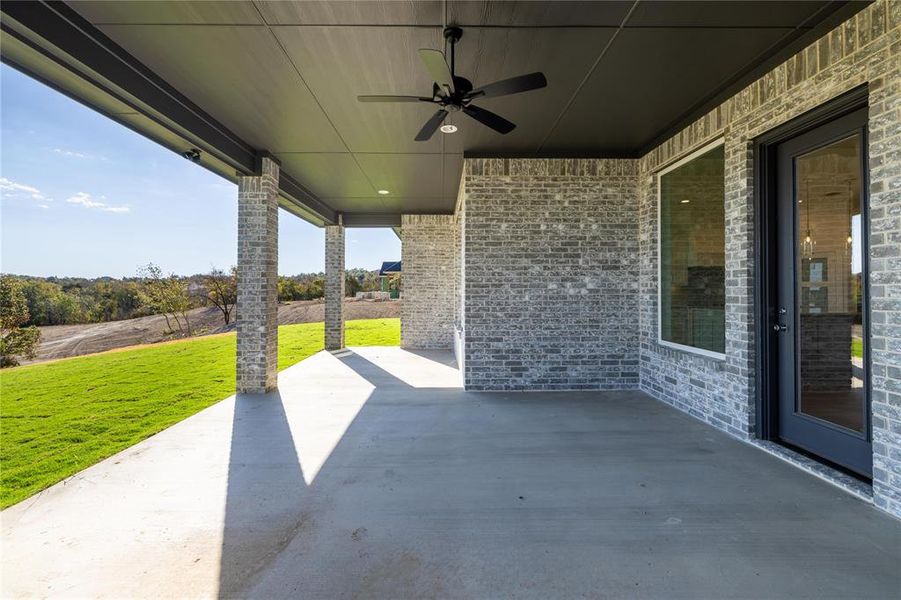 View of patio with ceiling fan