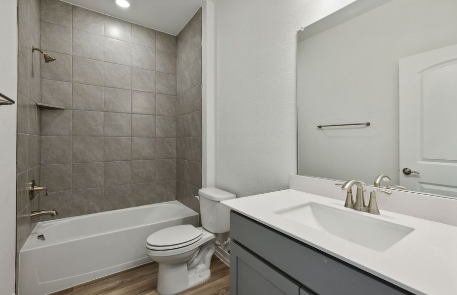 Spacious secondary bathroom with premium finishes