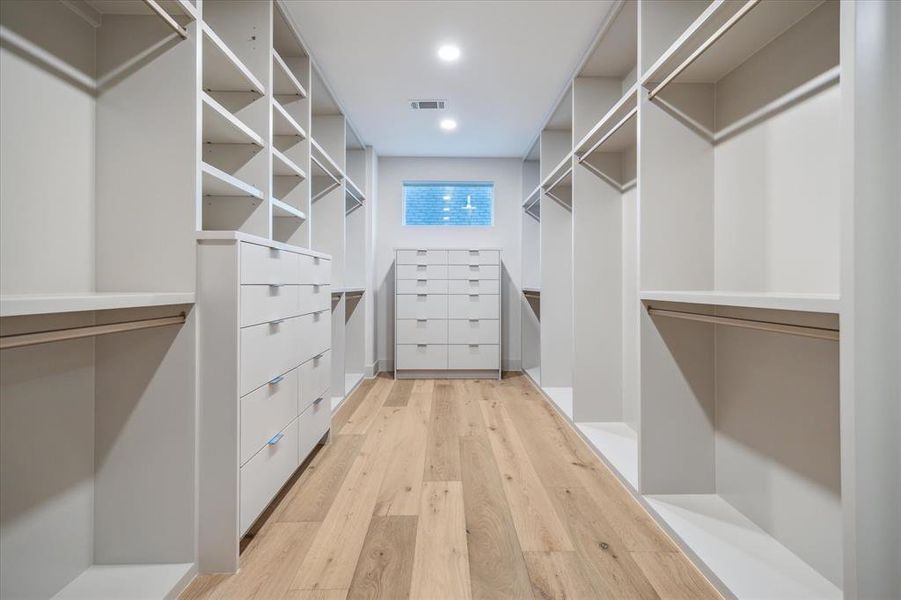 One of two walk in Primary Closets with excellent built ins.