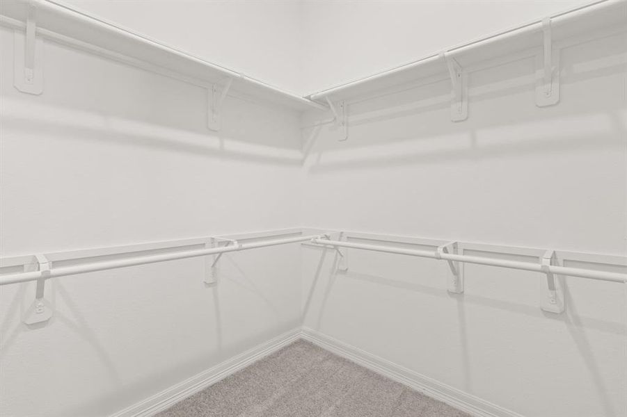A view of your large primary walk-in Closet