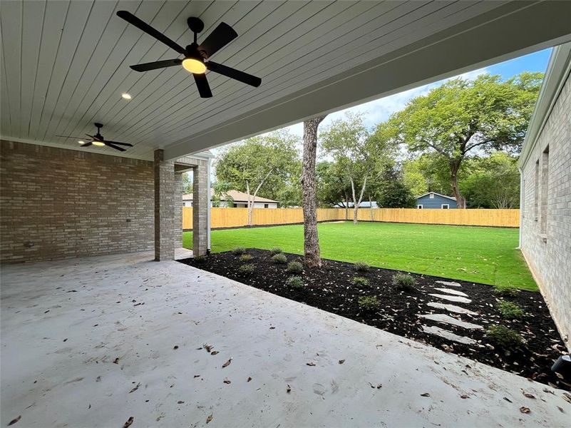 View of patio with ceiling fan