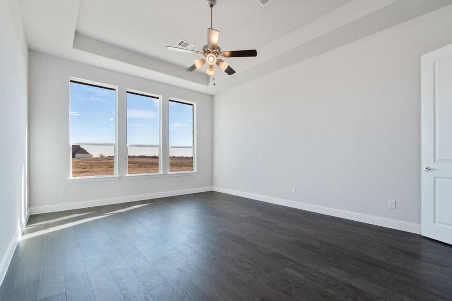 Primary Bedroom | Concept 2406 at Hidden Creek Estates in Van Alstyne, TX by Landsea Homes