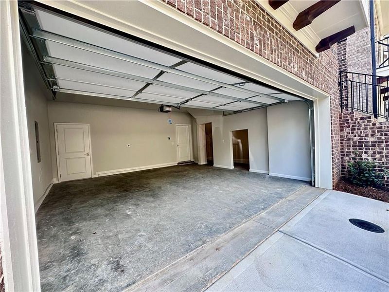 Front entry home design, showcases oversize car garage plus additional storage space