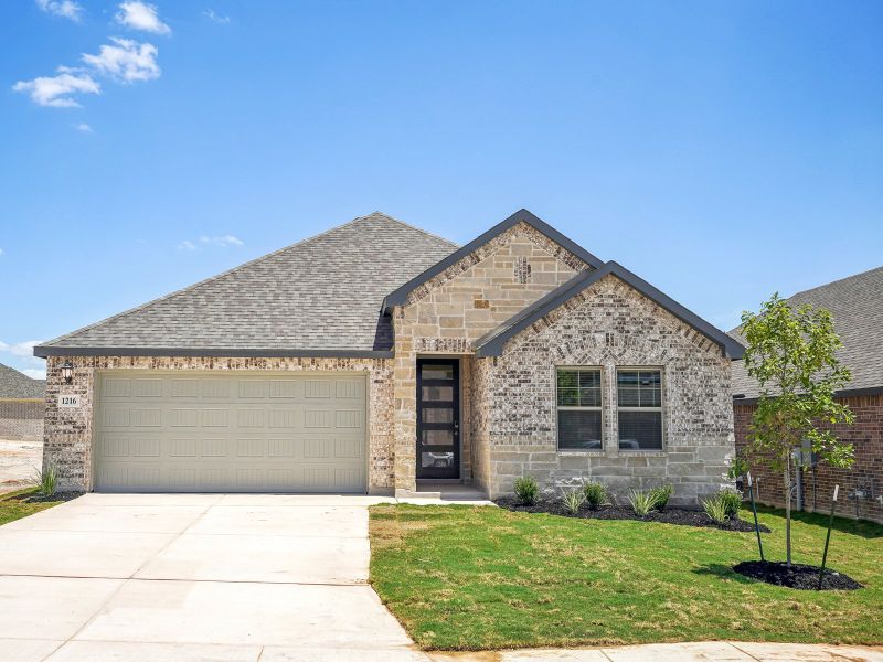 Front exterior of the Fitzhugh floorplan at a Meritage Homes community.