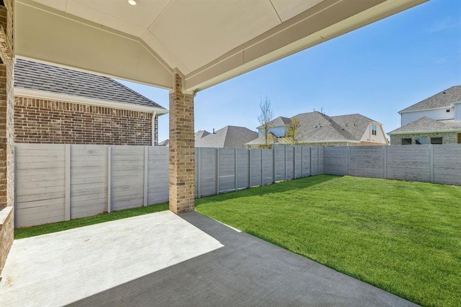 View of yard with a patio area