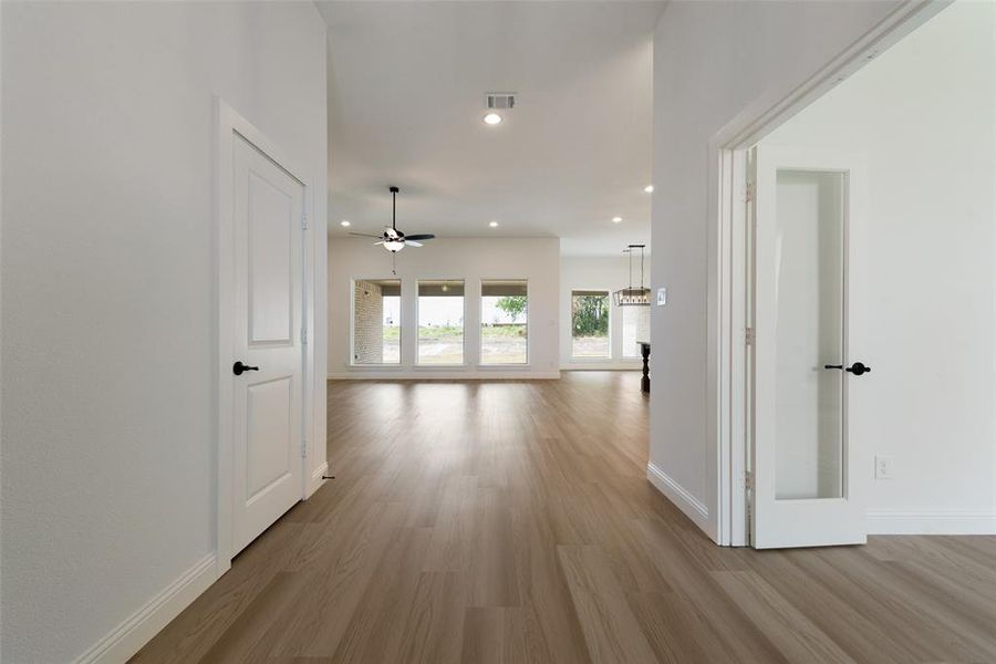 Hallway featuring hardwood / wood-style floors