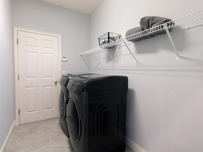 Laundry room - Westin home plan by Highland Homes