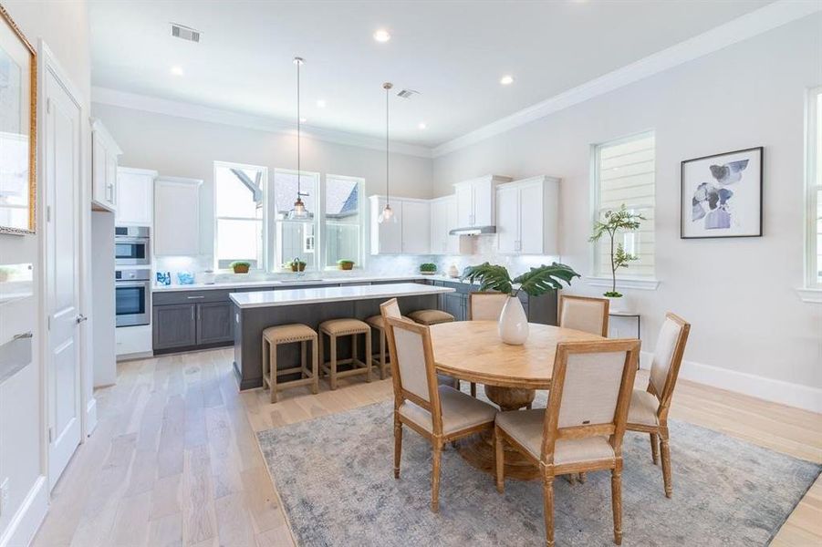 Huge dining space with plenty of room for adding the leaves and extending the table for the holidays!