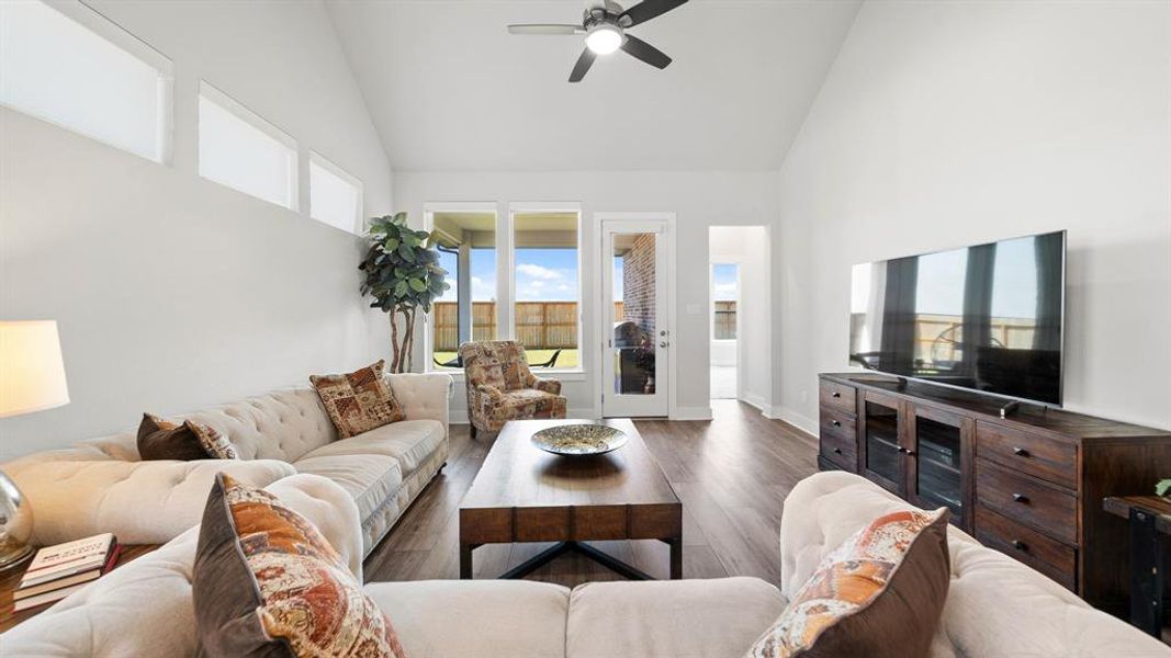 Gather the family and guests together in your huge living room! Featuring vaulted ceilings and large windows that provide plenty of natural lighting throughout the day!