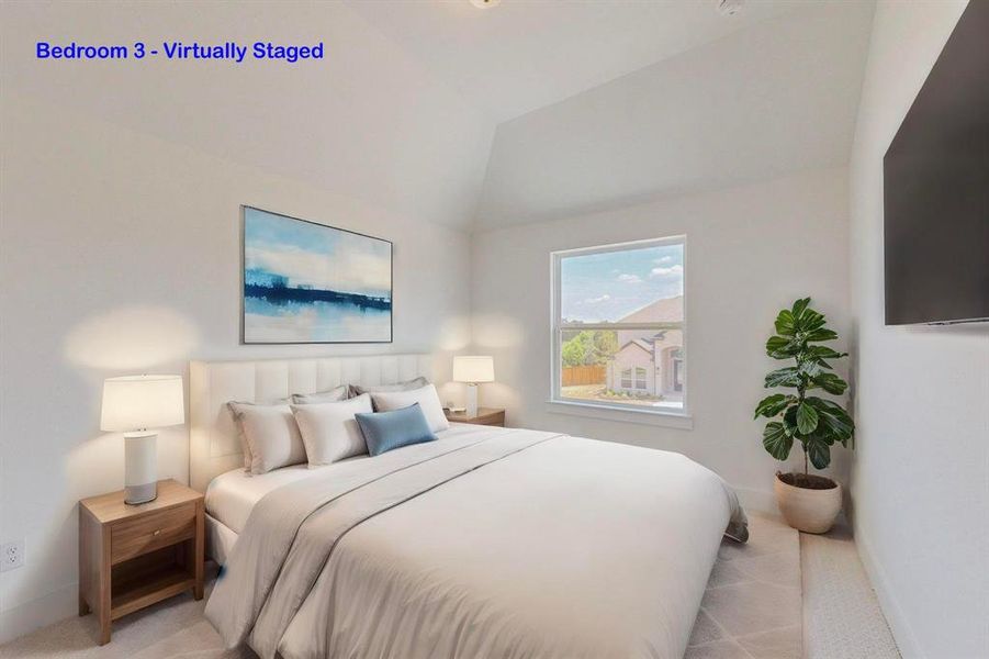 Carpeted bedroom featuring vaulted ceiling