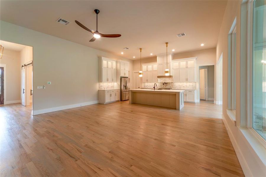 Den to kitchen showing foyer and study.