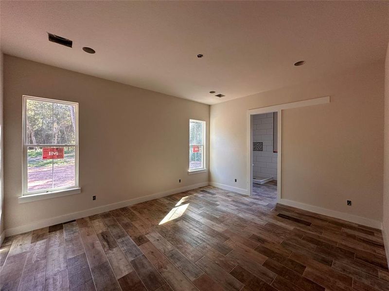 Light and bright large primary bedroom