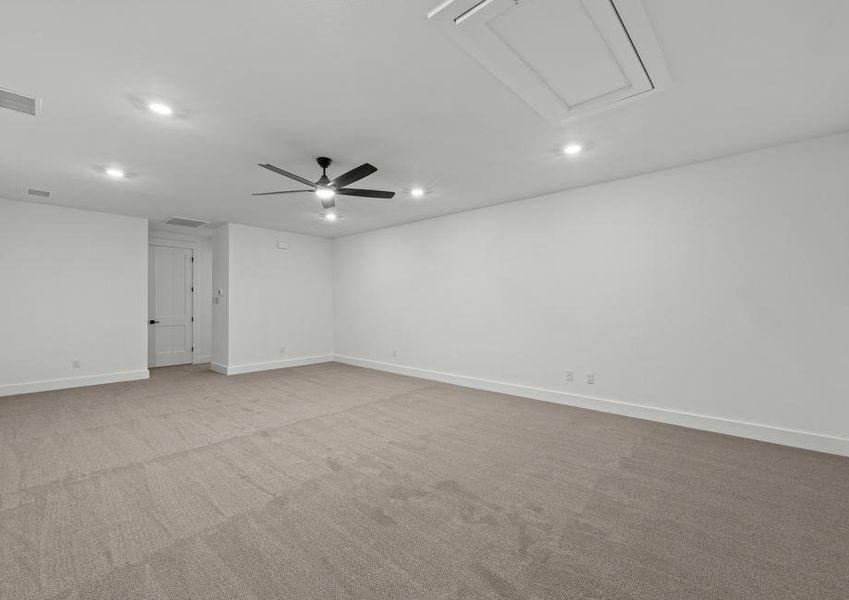 Upstairs, there is a large media room, powder room and storage closet.