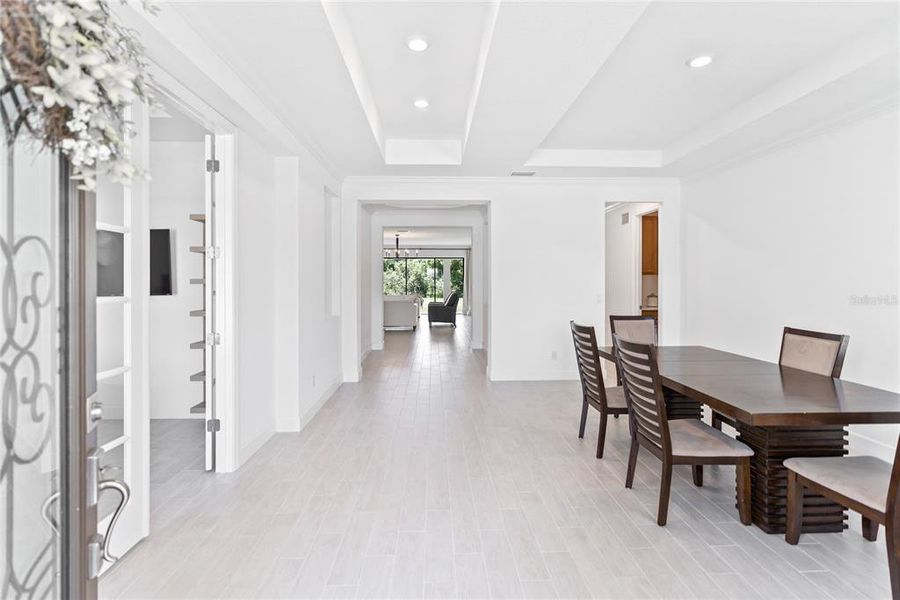 High Ceilings and Coffered details greet you at the front entry