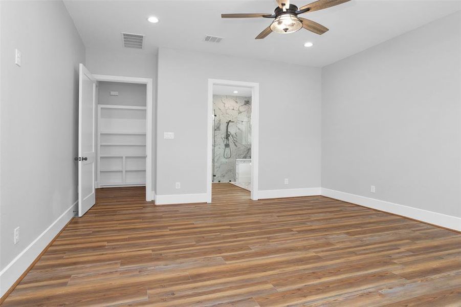 Primary has an ensuite and modern ceiling fan.