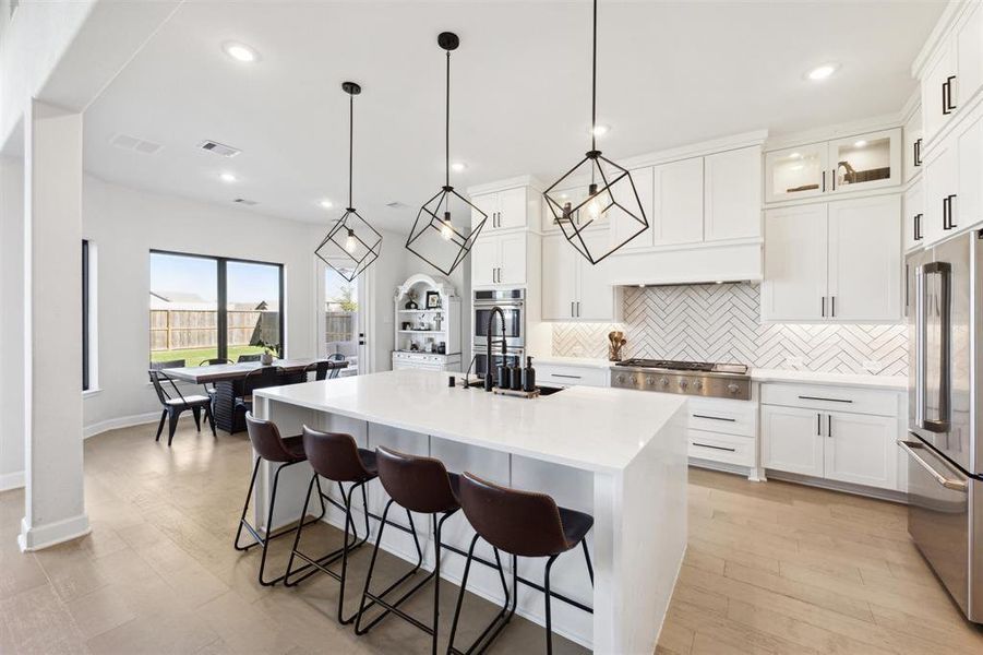 Another view of this chefs kitchen, with plenty of room for gathering.