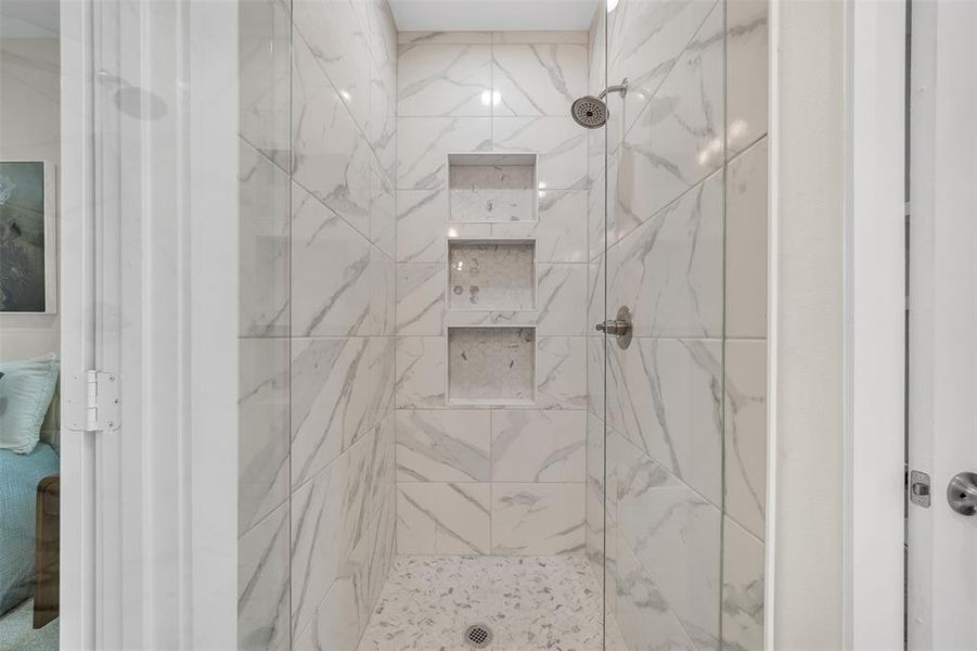 Master Bathroom featuring tiled shower