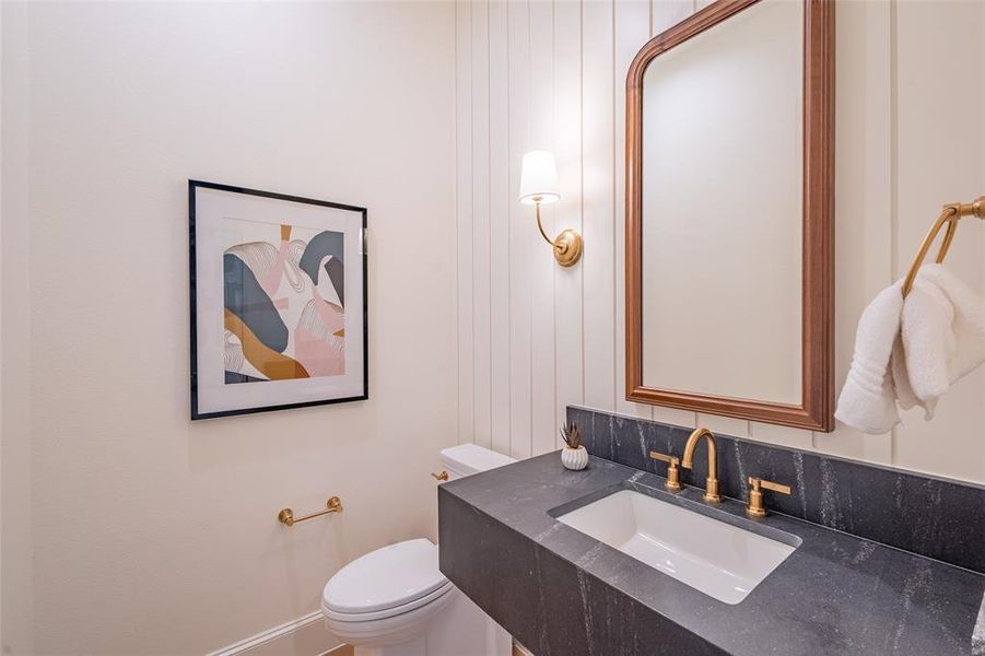 Bathroom featuring vanity and toilet