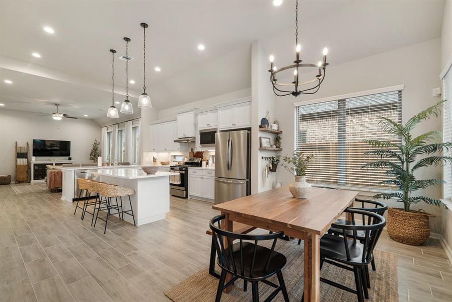 Dining area connects into kitchen area.