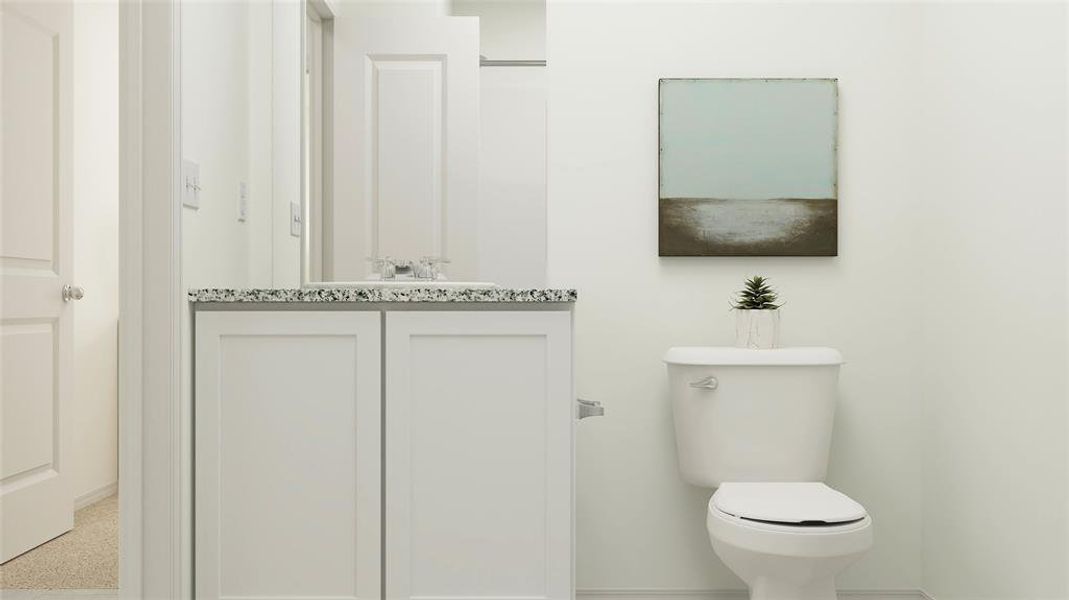 Bathroom featuring toilet and vanity