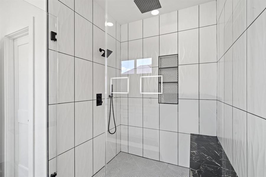 Bathroom with tiled shower