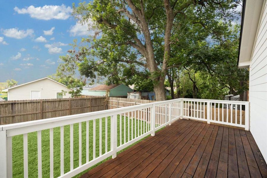 Bring your grill and outdoor seating, this expansive deck is ready to host your next summer BBQ or backyard birthday party.