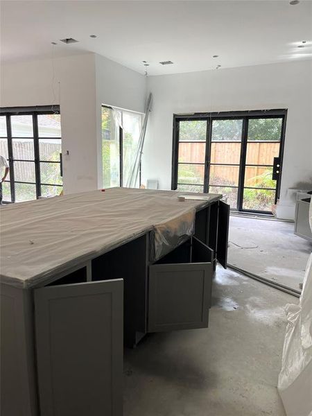 The kitchen, currently under construction, will be the epitome of modern luxury and functionality. The custom-fitted cabinetry, meticulously designed and built to your specifications, promises to offer both style and ample storage