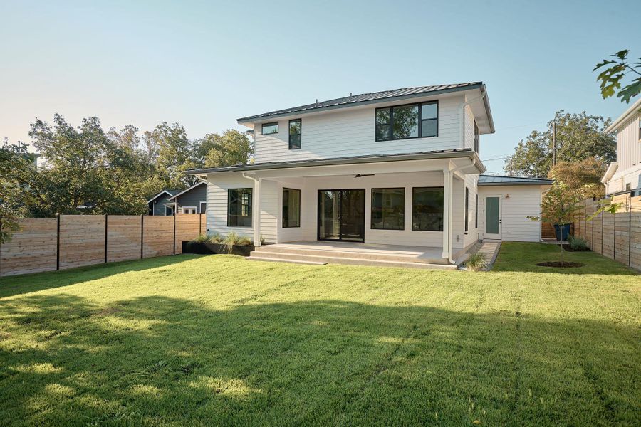 Very large covered back porch and yard. Plenty of room for a pool.