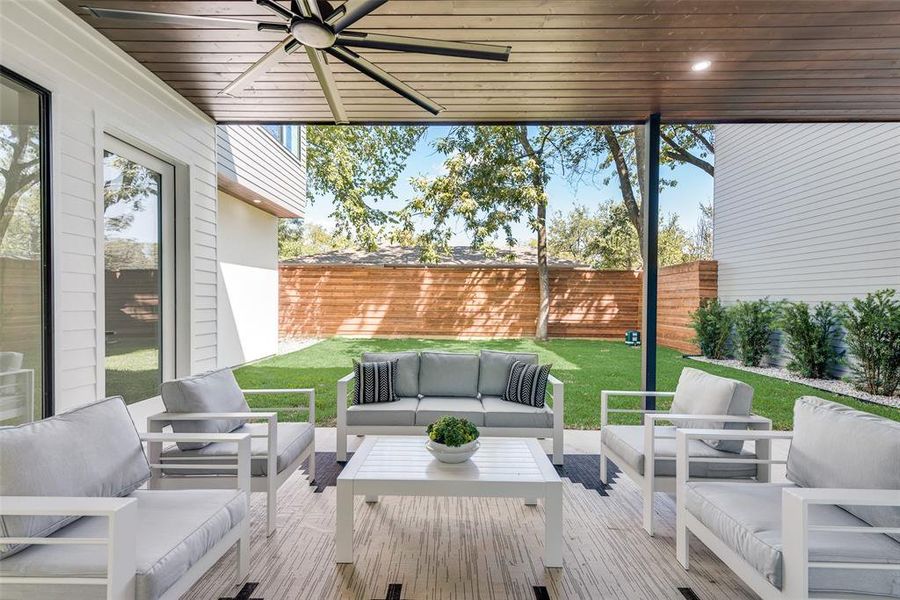 Deck featuring ceiling fan and an outdoor hangout area